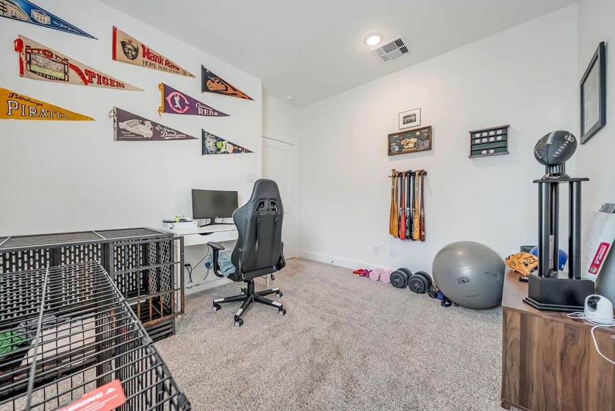 Furnished interior view inside a new home in The Groves, Humble (Image 17).