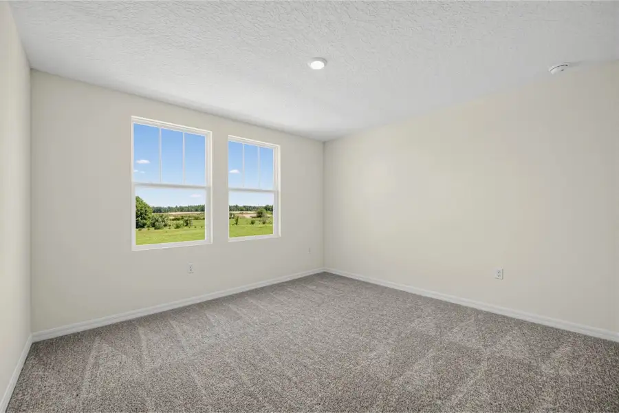 Spacious, unfurnished interior of a new home in Trailside, Mount Dora (Image 20).