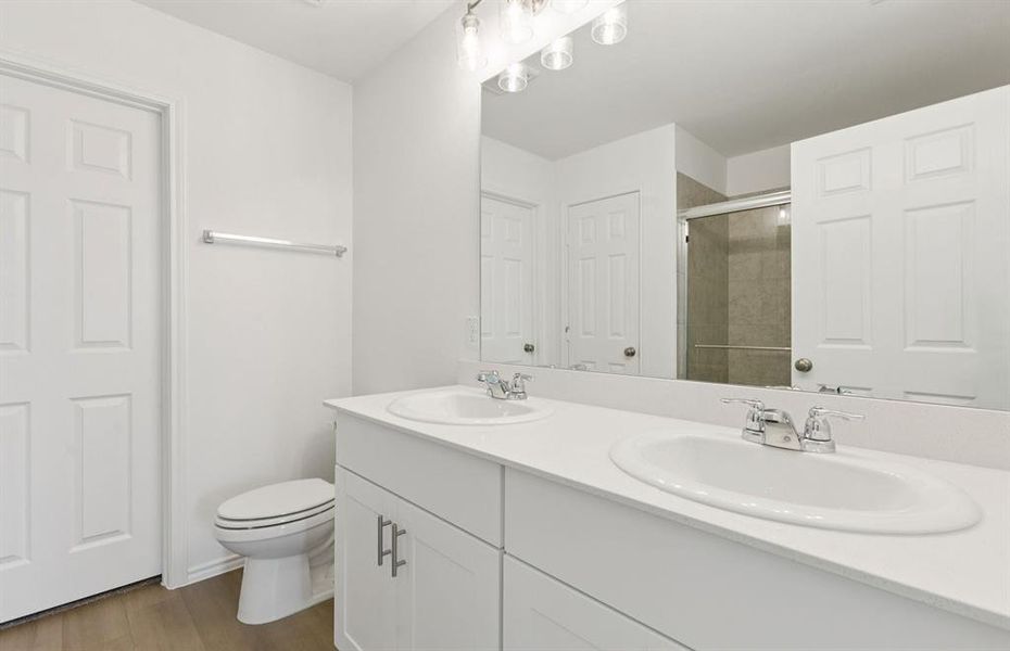 Owner's private bathroom with double vanity Owner's private bathroom with double vanity