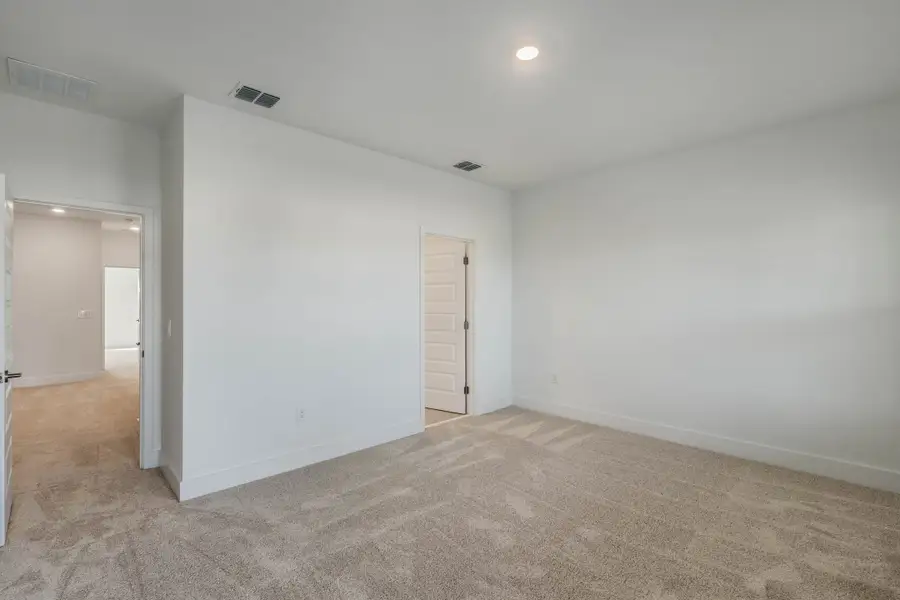 Spacious, unfurnished interior of a new home in Harvest at Ovation - Townhomes, Winter Garden (Image 23).