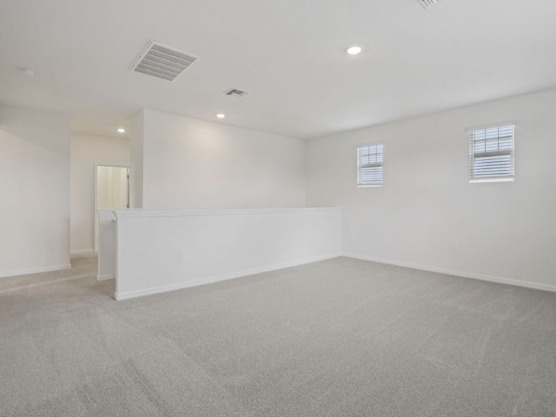 Spacious, unfurnished interior of a new home in Coasterra - Reserve Series, Palmetto (Image 17).