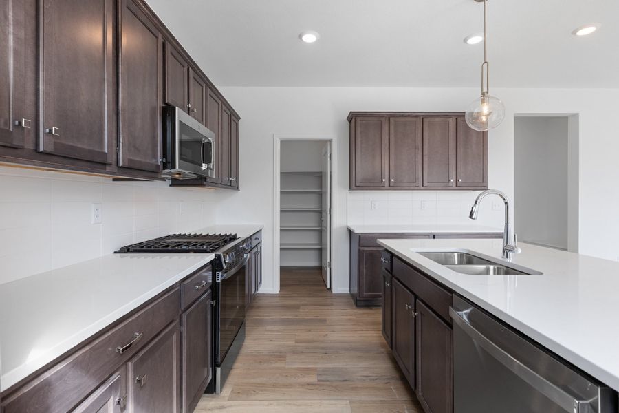 Furnished interior view inside a new home in The Cottages Collection at Ridgeline Vista, Brighton (Image 5).