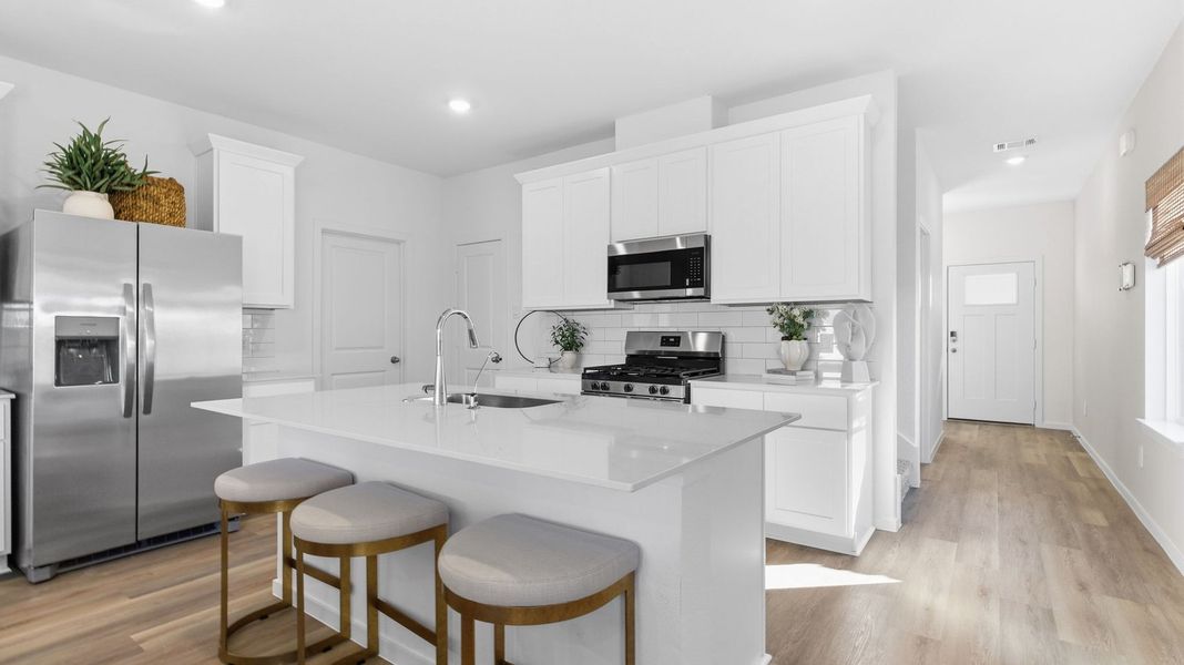 Furnished interior view inside a new home in Caldwell Crossing, Iowa Colony (Image 6). Furnished interior view inside a new home in Caldwell Crossing, Iowa Colony (Image 6).