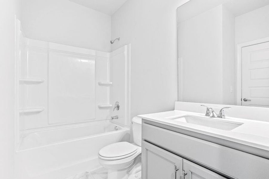 Furnished interior view inside a new home in Waters Edge, Mansfield (Image 8).