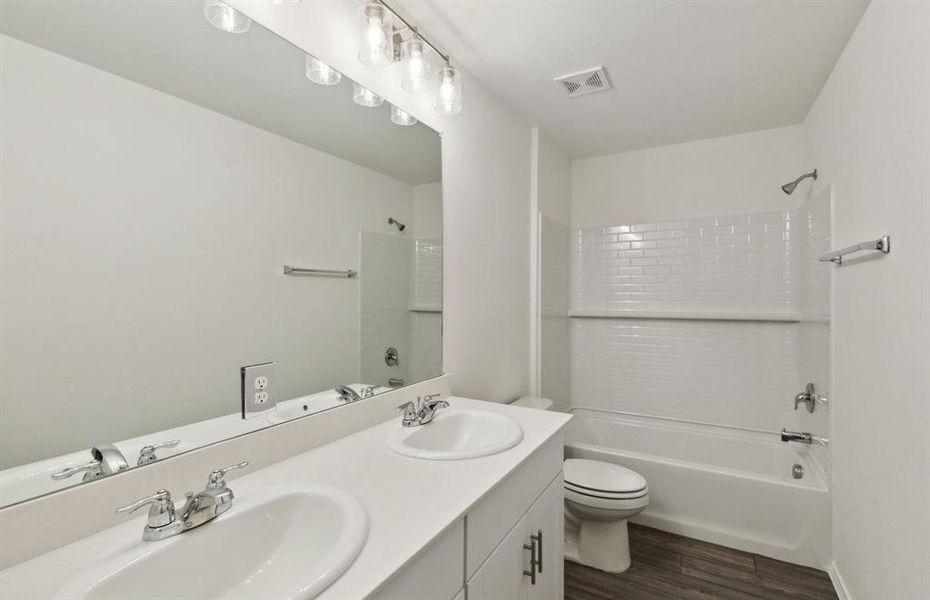 Upgraded secondary bathroom*real home pictured