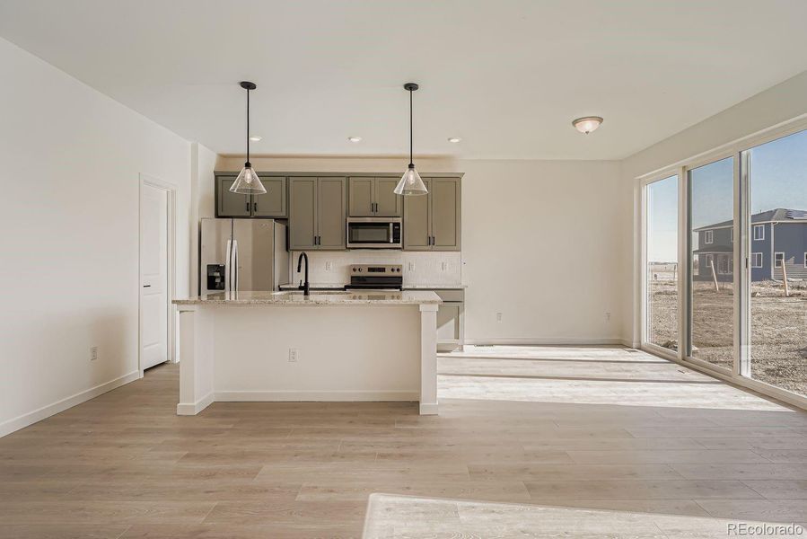 Images not from actual home, but are from same floor plan.