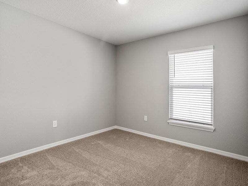 Secondary bedrooms provide space for everyone in your household - Ashlyn by Highland Homes