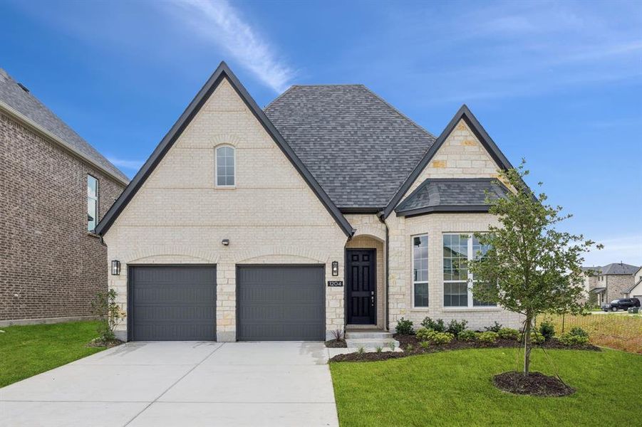 Front exterior of a new home in Bellagio, Forney, TX, highlighting curb appeal (Image 1). Front exterior of a new home in Bellagio, Forney, TX, highlighting curb appeal (Image 1).