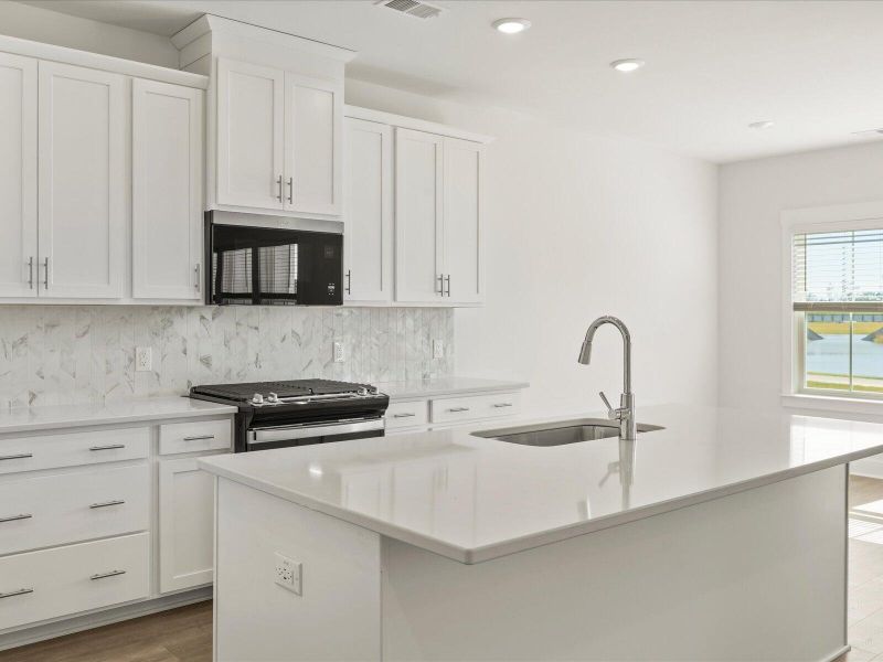 Furnished interior view inside a new home in The Coves at Lakes of Cane Bay II, Summerville (Image 11).