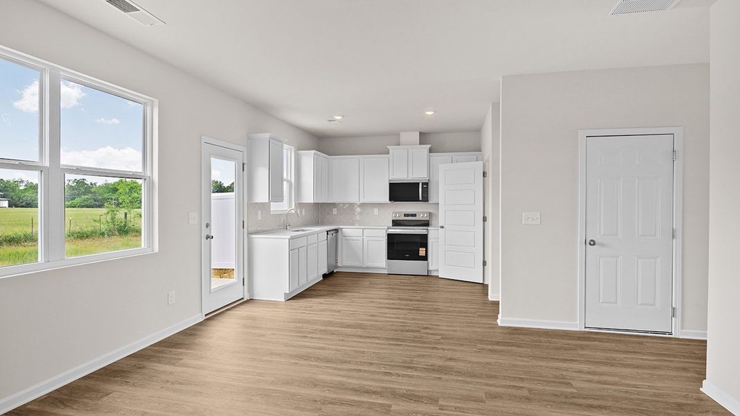 Representative unfurnished interior of a home built from the Edgewood Express - Duplex by D.R. Horton in Remington Chase, Perry (Image 16).