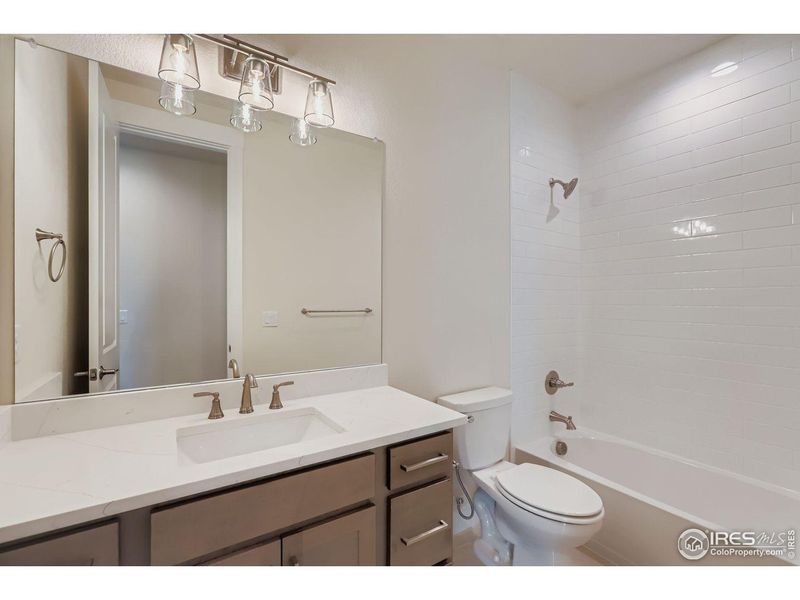 Furnished interior view inside a new home in RainDance, Windsor (Image 14).