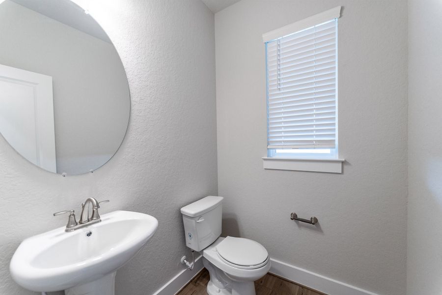Furnished interior view inside a new home in The Woodlands at Medina Hills, Mico (Image 9).
