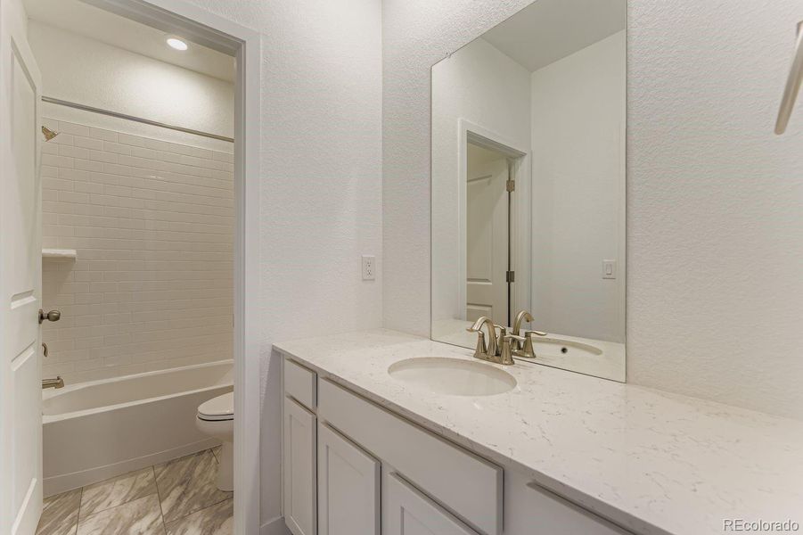 Furnished interior view inside a new home in Vermilion Creek: The Skyline Collection, Centennial (Image 8).
