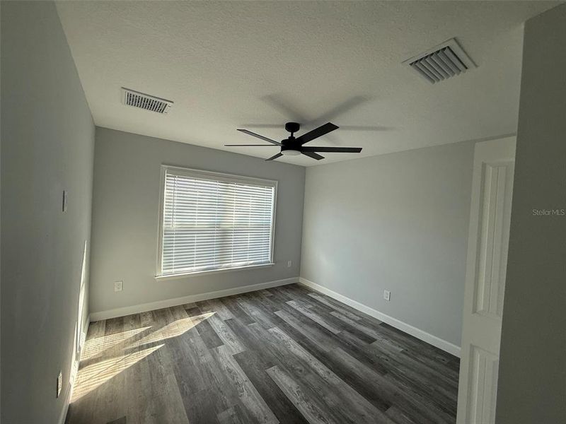 Spacious, unfurnished interior of a new home in , Okeechobee (Image 9).