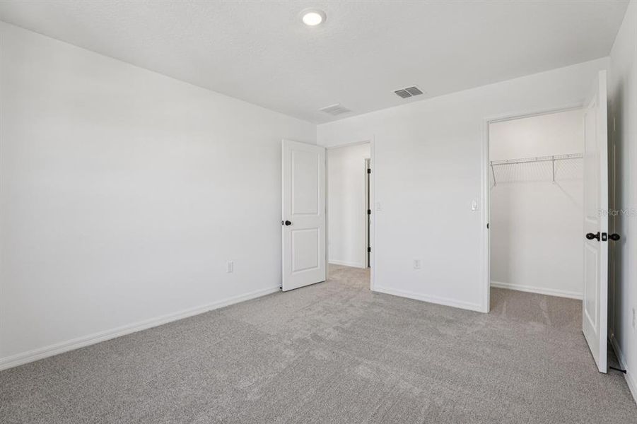 Spacious, unfurnished interior of a new home in Tyson Reserve, St. Cloud (Image 21).