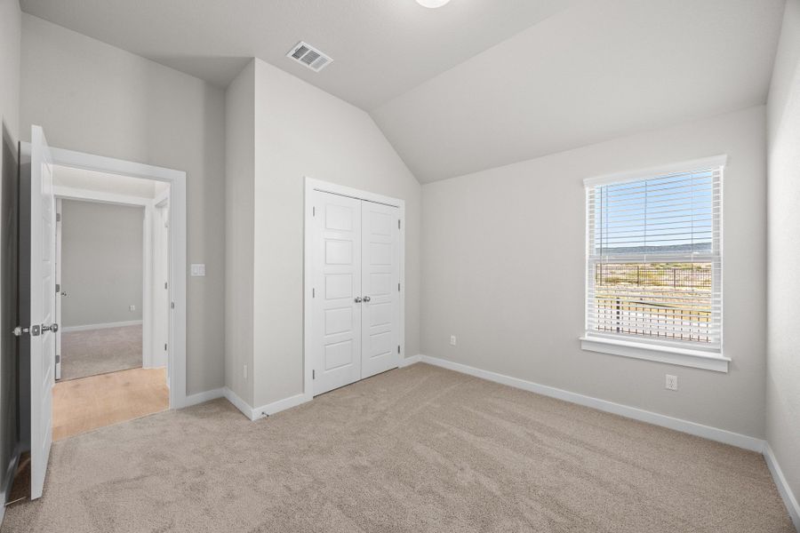 Bedroom in the Cypress home plan by Trophy Signature Homes - REPRESENTATIVE PHOTO Bedroom in the Cypress home plan by Trophy Signature Homes - REPRESENTATIVE PHOTO