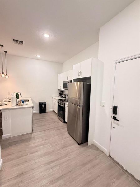 Furnished interior view inside a new home in , Davenport (Image 23).