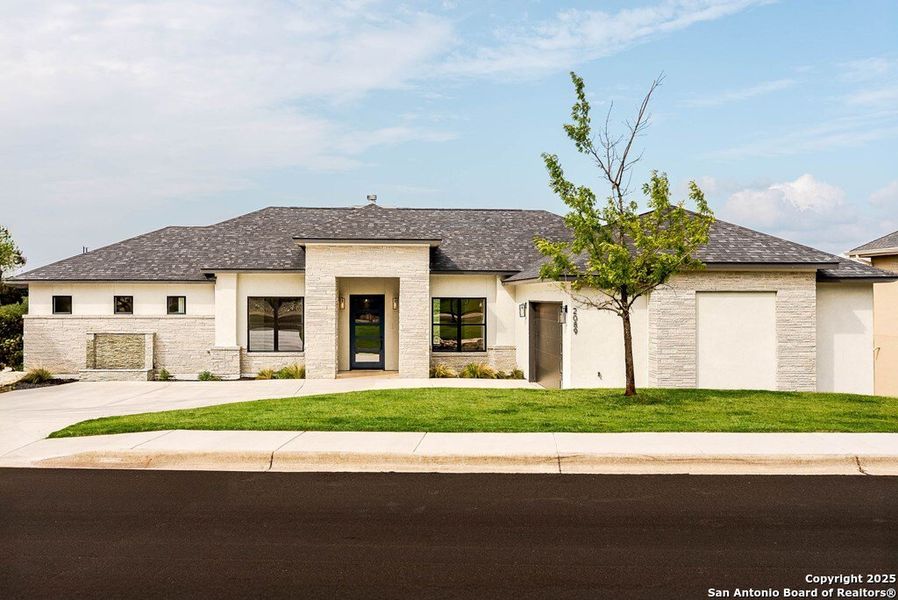 Front exterior of a new home in , Kerrville, TX, highlighting curb appeal (Image 25). Front exterior of a new home in , Kerrville, TX, highlighting curb appeal (Image 25).