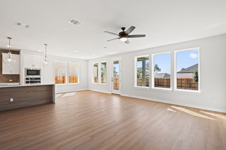 Spacious, unfurnished interior of a new home in Terrace Collection at Heritage, Dripping Springs (Image 17).