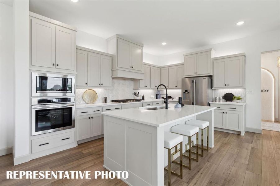 Style and sophistication abound in this dream kitchen!  REPRESENTATIVE PHOTO