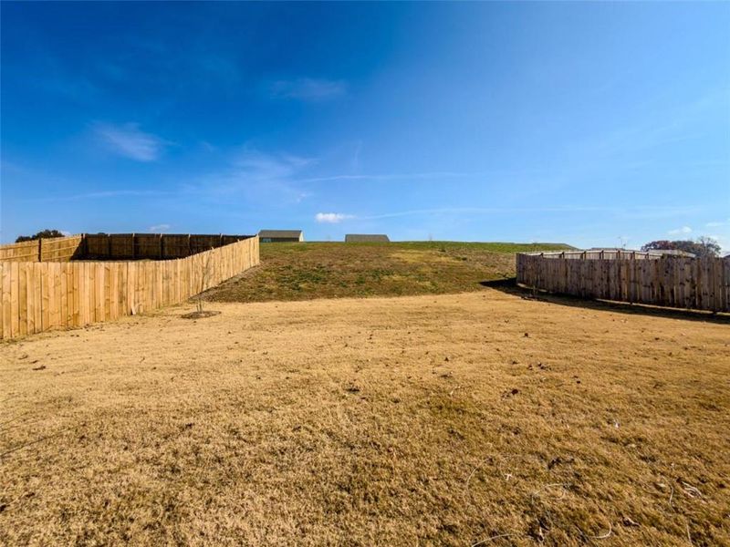 Exterior details and patio area of a home in Bentwater, Hoschton (Image 29). Exterior details and patio area of a home in Bentwater, Hoschton (Image 29).
