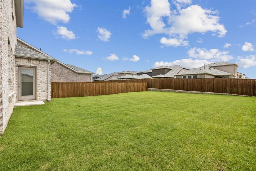 Front exterior of a new home in AnaCapri, Anna, TX, highlighting curb appeal (Image 16).