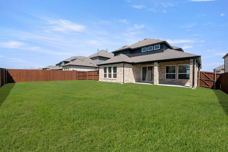 Exterior details and patio area of a home in Westside Preserve, Midlothian (Image 21).