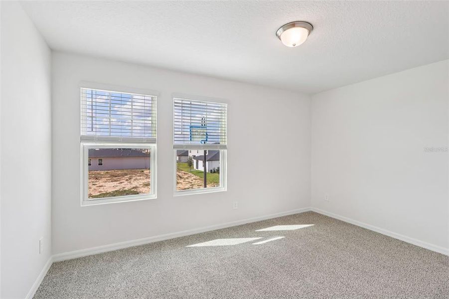 Spacious, unfurnished interior of a new home in Crosswinds - Signature Series, Haines City (Image 27).