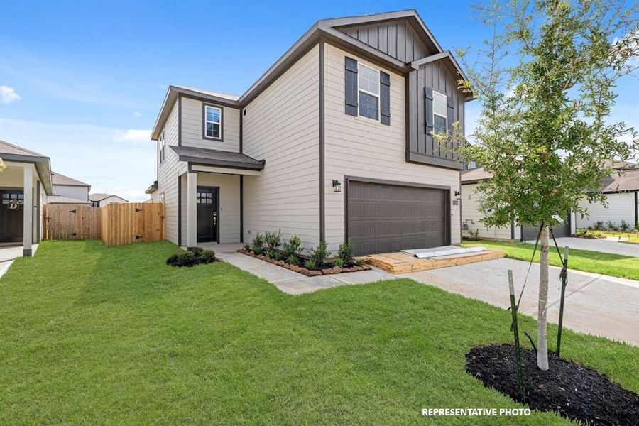 A house with a driveway. A house with a driveway.