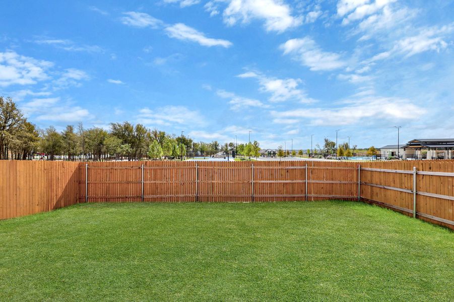 Exterior details and patio area of a home in Trinity Ranch, Elgin (Image 21).