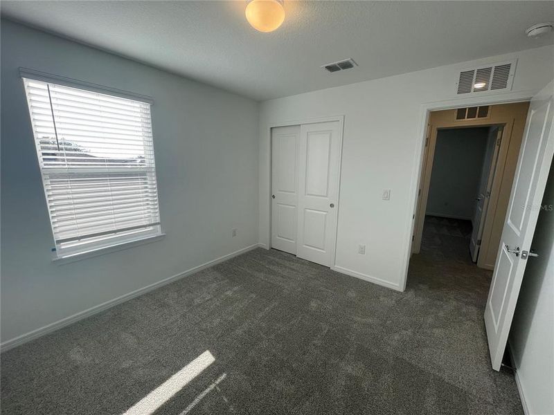 Spacious, unfurnished interior of a new home in Isles at BayView, Parrish (Image 24).