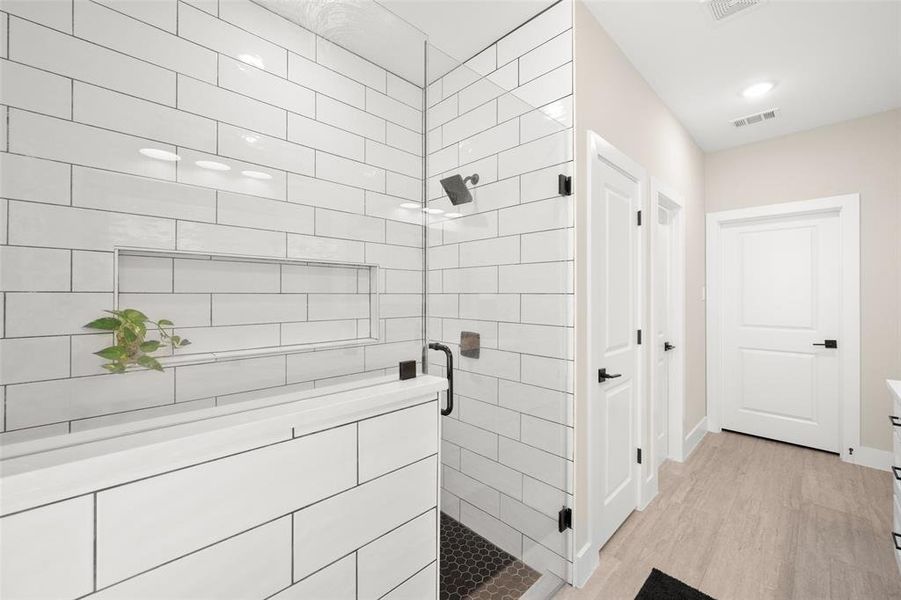 Bathroom with tile and oversized  shower