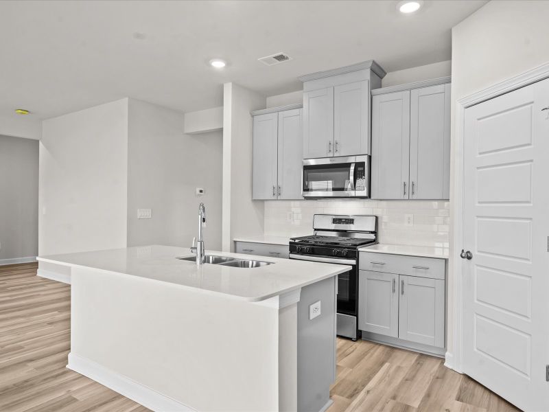 Furnished interior view inside a new home in Chatham Forest, Duncan (Image 4).