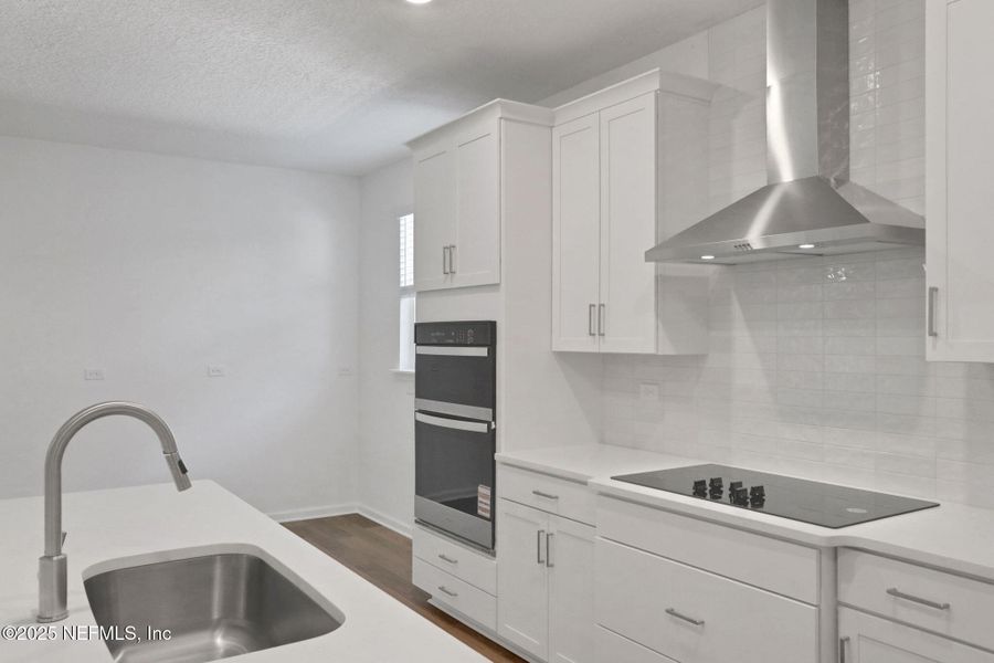 Furnished interior view inside a new home in Hyland Trail, Green Cove Springs (Image 6).