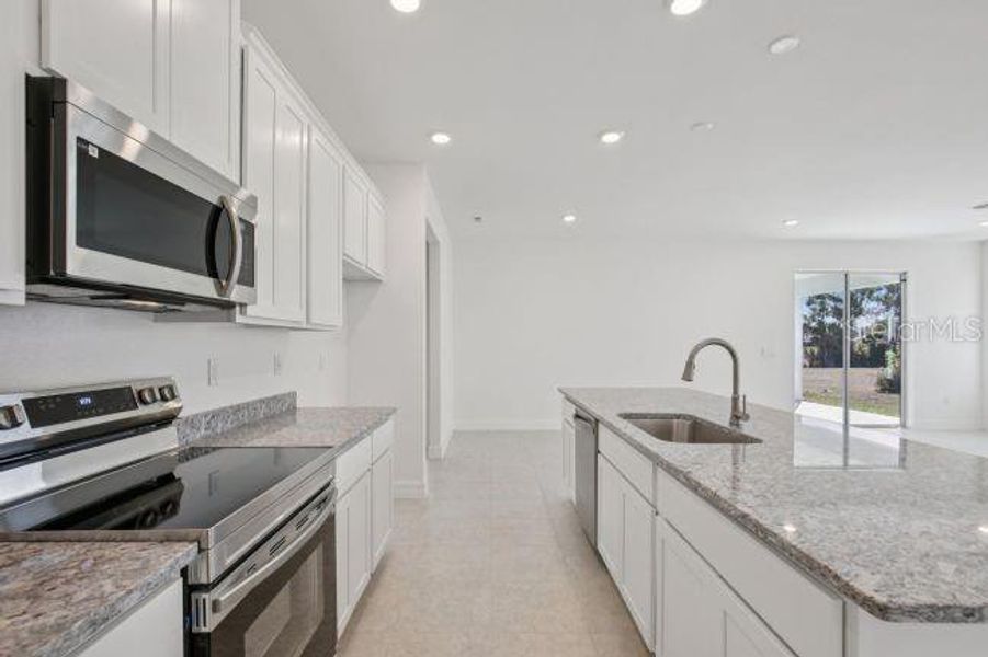 Furnished interior view inside a new home in , Punta Gorda (Image 8).