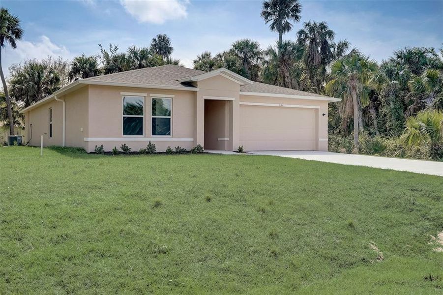 Front exterior of a new home in Citrus Springs, Citrus Springs, FL, highlighting curb appeal (Image 13).