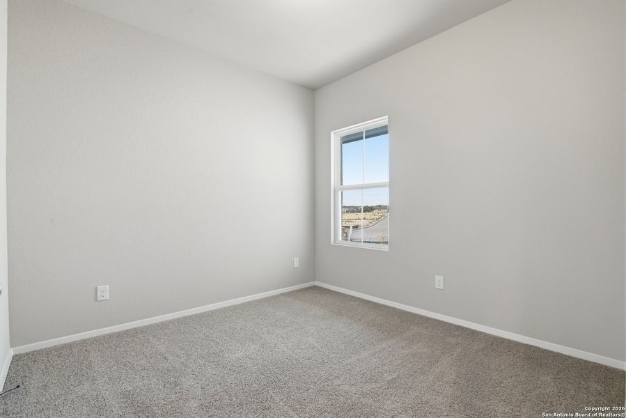 Spacious, unfurnished interior of a new home in Hunters Ranch, San Antonio (Image 30).
