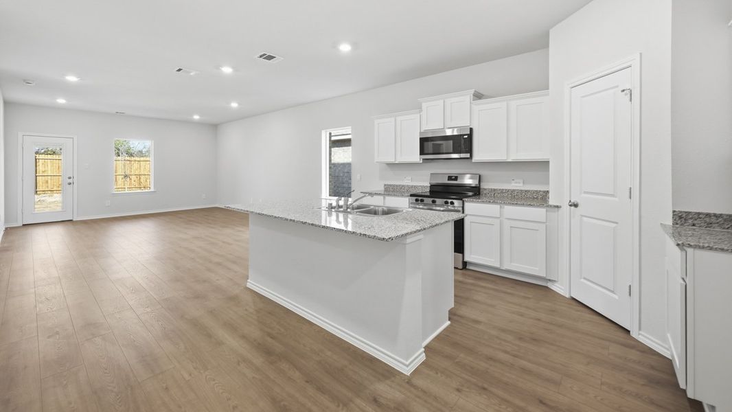 Representative furnished interior of a home built from the Kirby by D.R. Horton in Sweetwater Springs, Sherman (Image 5).