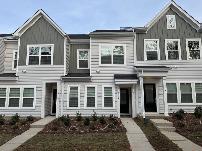 Front exterior of a new home in Lakeview Village, Charlotte, NC, highlighting curb appeal (Image 1).
