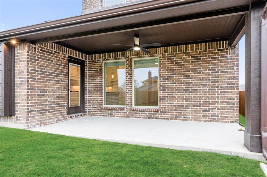 Exterior details and patio area of a home in Villages of Hurricane Creek, Anna (Image 4).