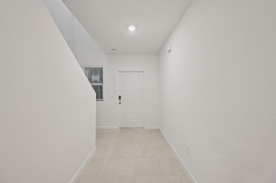 Spacious, unfurnished interior of a new home in Meritage Homes at Terra Lago - Premier Series, Indiantown (Image 13).