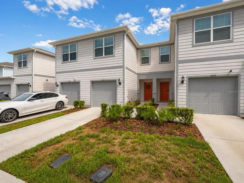 Front exterior of a new home in , Davenport, FL, highlighting curb appeal (Image 2). Front exterior of a new home in , Davenport, FL, highlighting curb appeal (Image 2).