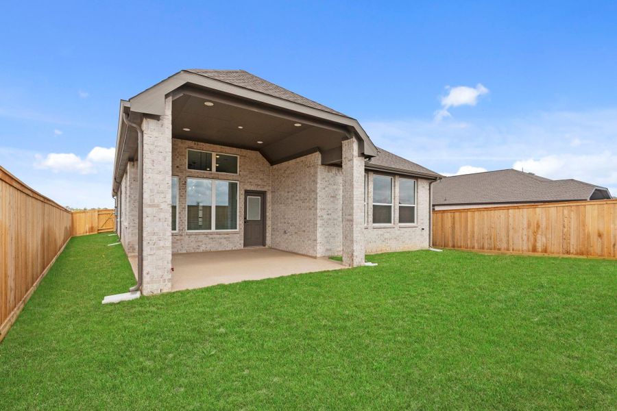 Exterior details and patio area of a home in Bridgeland, Cypress (Image 20).