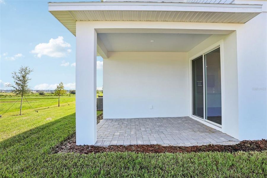 Front exterior of a new home in Isla Mirada, San Antonio, FL, highlighting curb appeal (Image 2).