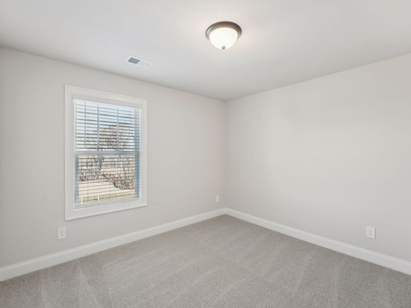 Spacious, unfurnished interior of a new home in Hemingway - Highland Series, Cumming (Image 19).