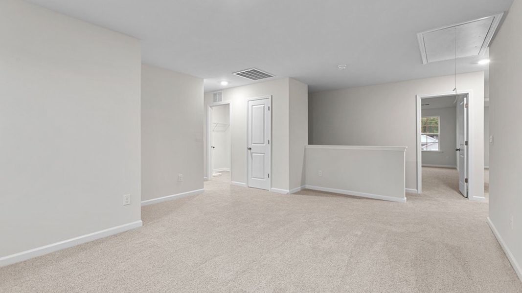 Spacious, unfurnished interior of a new home in The Landing at Summerhaven, Mebane (Image 22).