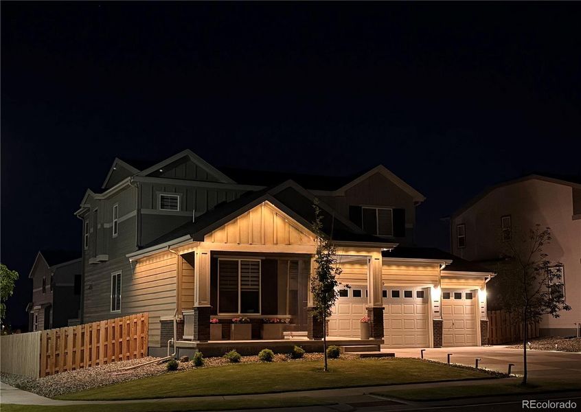 Front exterior of a new home in , Commerce City, CO, highlighting curb appeal (Image 1).