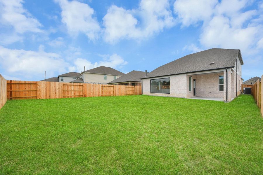 Come and see this spacious backyard with its beautiful covered patio. There is plenty of room for the kids to play and adults to relax. Perfect for your outdoor living space, patio furniture, bbq pit, and so much more. The possibilities are endless! Come and see this spacious backyard with its beautiful covered patio. There is plenty of room for the kids to play and adults to relax. Perfect for your outdoor living space, patio furniture, bbq pit, and so much more. The possibilities are endless!