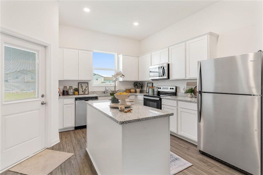 Furnished interior view inside a new home in Sol Vista, Dundee (Image 23).