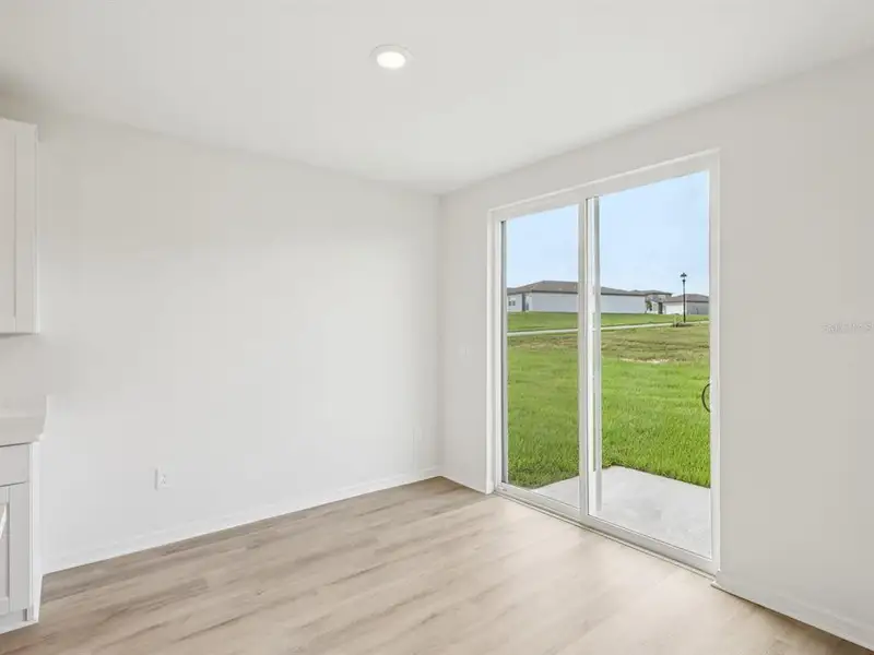 Spacious, unfurnished interior of a new home in The Reserve at Van Oaks, Auburndale (Image 19).